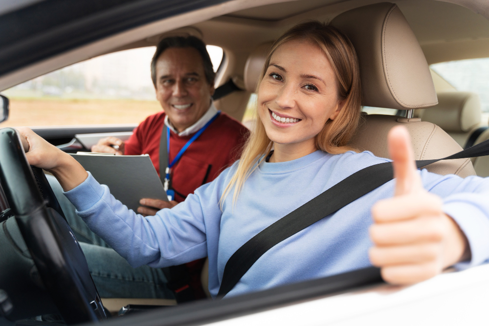 woman-male-driving-instructor-during-driving-test (1)